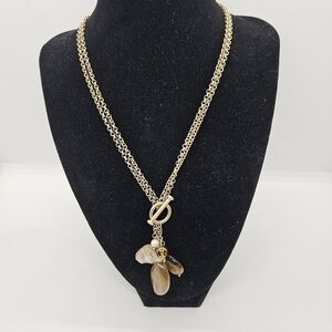 gold tone double chain necklace with tigers eye shell and acrylic pendants